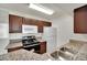 Traditional kitchen with stainless steel oven and microwave, a white refrigerator, and granite countertops at 5170 S Jones Blvd # 205, Las Vegas, NV 89118