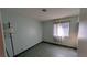 Room with light green walls and a window providing natural light at 5268 Gains Mill St, Las Vegas, NV 89122