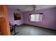 Versatile room with ceiling fan, window, and access to the kitchen at 5268 Gains Mill St, Las Vegas, NV 89122