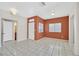 Bright, airy living room with neutral tile flooring and ample natural light from windows at 5331 Heatherbrook Cir, Las Vegas, NV 89120