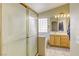 Bright bathroom featuring a shower, a bath tub and a single vanity at 5437 Escallonia St, Las Vegas, NV 89149