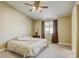 Comfortable bedroom with natural light, a ceiling fan, and neutral tones at 5437 Escallonia St, Las Vegas, NV 89149