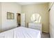 Bright bedroom offering a closet, a door to another room, and neutral paint at 5437 Escallonia St, Las Vegas, NV 89149