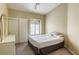 Well-lit bedroom featuring built-in closet, a window and neutral paint at 5437 Escallonia St, Las Vegas, NV 89149