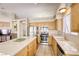 Open kitchen featuring stainless steel appliances and tile countertops at 5437 Escallonia St, Las Vegas, NV 89149