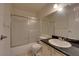 This bathroom features a shower with sliding glass doors, toilet, and sink with vanity at 5526 Orchard Ln # 0, Las Vegas, NV 89110