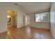 A spacious bedroom with wood floors, natural light and an ensuite bathroom at 5526 Orchard Ln # 0, Las Vegas, NV 89110