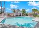 Sparkling community pool with lounge area and well-maintained landscaping, perfect for relaxation and outdoor enjoyment at 5526 Orchard Ln # 0, Las Vegas, NV 89110