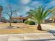 Charming single-story home featuring a well-maintained front yard and mature landscaping at 6397 Kell Ln, Las Vegas, NV 89156