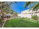 Lovely backyard featuring a covered patio and verdant lawn at 64 Chateau Whistler Ct, Las Vegas, NV 89148