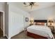Relaxing bedroom with a ceiling fan, closet, and comfortable furnishings at 64 Chateau Whistler Ct, Las Vegas, NV 89148