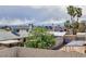 Backyard with palm trees at 6401 Goldmine Dr, Las Vegas, NV 89156