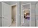 Bright primary bathroom featuring toilet and access to main bedroom at 651 Penshaw Bridge Ave, Las Vegas, NV 89178
