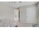 Simple bedroom showcasing a spacious closet and neutral paint scheme at 651 Penshaw Bridge Ave, Las Vegas, NV 89178