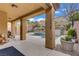 Stylish outdoor living features a covered patio with a scenic pool view at 651 Penshaw Bridge Ave, Las Vegas, NV 89178