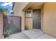 Inviting front entrance featuring a dark-colored door and a small, gated yard at 651 Penshaw Bridge Ave, Las Vegas, NV 89178