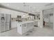 Bright kitchen features stainless steel appliances, white cabinetry, and granite countertops at 651 Penshaw Bridge Ave, Las Vegas, NV 89178