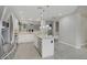 Bright open kitchen with a large island and modern stainless-steel appliances at 651 Penshaw Bridge Ave, Las Vegas, NV 89178