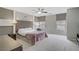 Main bedroom with neutral tones, carpet, fan and tasteful decor at 651 Penshaw Bridge Ave, Las Vegas, NV 89178