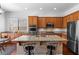 Stylish kitchen features granite countertops and stainless steel appliances at 6917 Puetollano Dr, North Las Vegas, NV 89084
