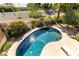 Backyard pool with landscaping and patio area at 6917 Puetollano Dr, North Las Vegas, NV 89084