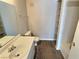 Bathroom featuring a vanity, toilet and tiled shower with built-in shelving at 7885 W Flamingo Rd # 2153, Las Vegas, NV 89147