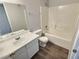 Clean bathroom with a shower-tub combo, single vanity, and updated fixtures at 7885 W Flamingo Rd # 2153, Las Vegas, NV 89147
