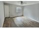 Bright bedroom with new floors, a large window, and neutral walls at 7885 W Flamingo Rd # 2153, Las Vegas, NV 89147