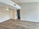 Bright living room showcasing hard surface flooring and fresh paint at 7885 W Flamingo Rd # 2153, Las Vegas, NV 89147