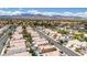 Panoramic aerial shot showcasing a peaceful residential neighborhood with well-maintained streets and mountain backdrop at 7905 Coral Point Ave, Las Vegas, NV 89128