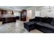 Open kitchen and living area featuring a center island and stainless steel appliances at 7905 Coral Point Ave, Las Vegas, NV 89128