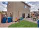 Spacious backyard with patio, grill, play area, and lush artificial turf, perfect for outdoor entertaining at 7919 Mineral Peak St, Las Vegas, NV 89166