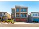Modern two-story home featuring a two-car garage, balcony, and well-maintained landscaping at 8179 Shale Canyon St, Las Vegas, NV 89139