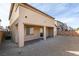 Backyard features a covered patio, sliding glass doors and low maintenance gravel at 844 Aurelie Ridge St, Henderson, NV 89011