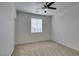 Bedroom with neutral carpet, ceiling fan, and a window offering natural light at 844 Aurelie Ridge St, Henderson, NV 89011