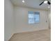 Bright bedroom with large window and neutral walls, ready for customization at 844 Aurelie Ridge St, Henderson, NV 89011