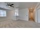 Open bonus room with neutral carpet and a ceiling fan, showcasing the layout and design at 844 Aurelie Ridge St, Henderson, NV 89011