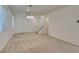 Open living area showcases a staircase, recessed lighting, double-door entry, and plush carpeting at 844 Aurelie Ridge St, Henderson, NV 89011