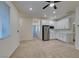 View of living area and mini kitchen with stainless steel appliances and easy access at 844 Aurelie Ridge St, Henderson, NV 89011