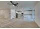Open floor plan showcasing living area connected to modern kitchen at 844 Aurelie Ridge St, Henderson, NV 89011
