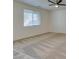 Bright living room with neutral carpet and a modern ceiling fan at 844 Aurelie Ridge St, Henderson, NV 89011