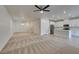 Expansive open concept living area connecting living room, dining, and kitchen spaces at 844 Aurelie Ridge St, Henderson, NV 89011