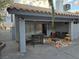 Back patio area featuring outdoor seating, a barbecue, and covered space at 853 Rusty Anchor Way, Henderson, NV 89002