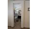 En-suite bathroom showcasing double sinks and a tub with gray tile at 853 Rusty Anchor Way, Henderson, NV 89002