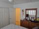 Bright bedroom with closet, dresser, and window at 853 Rusty Anchor Way, Henderson, NV 89002