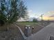 Landscaped walking path and park benches offer a serene environment for relaxation and community interaction at 853 Rusty Anchor Way, Henderson, NV 89002