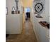 Neutral hallway featuring a decorative letter accent and an open doorway at 853 Rusty Anchor Way, Henderson, NV 89002