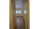 Hallway with access to a bedroom that features a window with shutters at 853 Rusty Anchor Way, Henderson, NV 89002