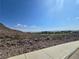 View of desert land near the mountains with a golf course in the background at 853 Rusty Anchor Way, Henderson, NV 89002
