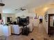 Spacious living room with tile flooring, vaulted ceilings, and neutral-toned walls at 853 Rusty Anchor Way, Henderson, NV 89002